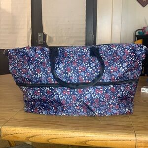 Mondani blue and red floral overnight bag